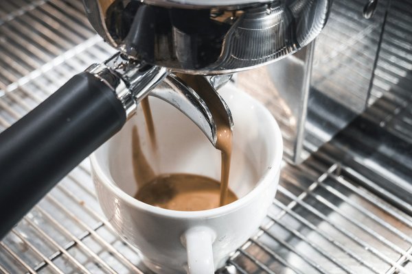 What guidelines should be followed when installing a commercial espresso machine in a small cafe?